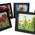 little floral paintings in black frame